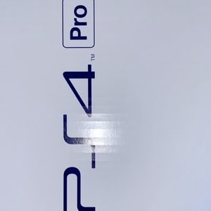 playstation 4 with three remote controllers with attachments, multiple games